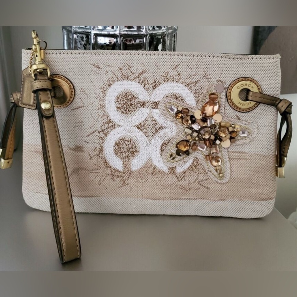 NWOT Elegant Coach Beige Clutch with Starfish Accent